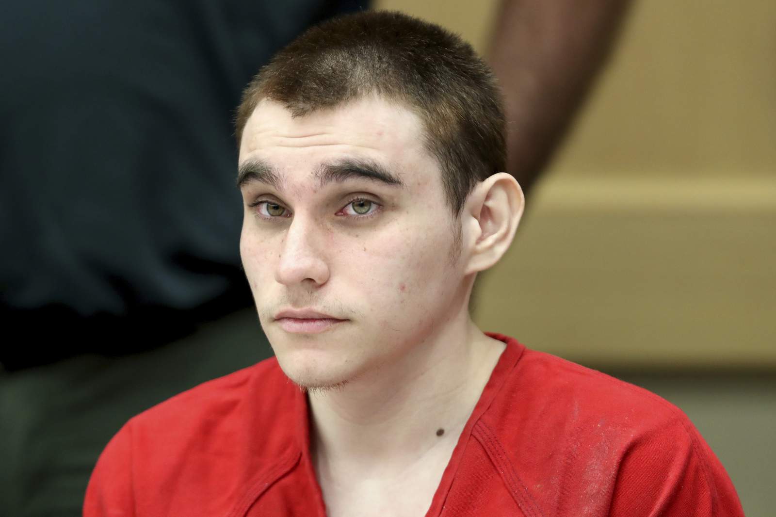 Couple apologizes for sheltering accused school shooter