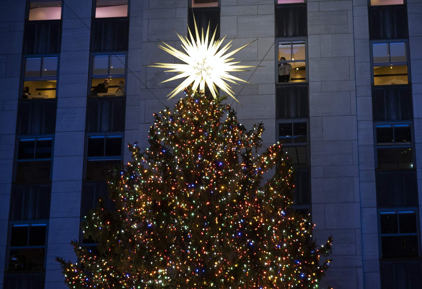 Rockefeller Center Christmas Tree turns on, with virus rules