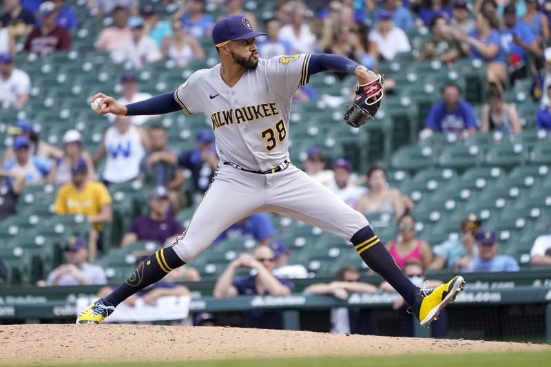 LEADING OFF: Brewers' Williams punches wall, breaks hand