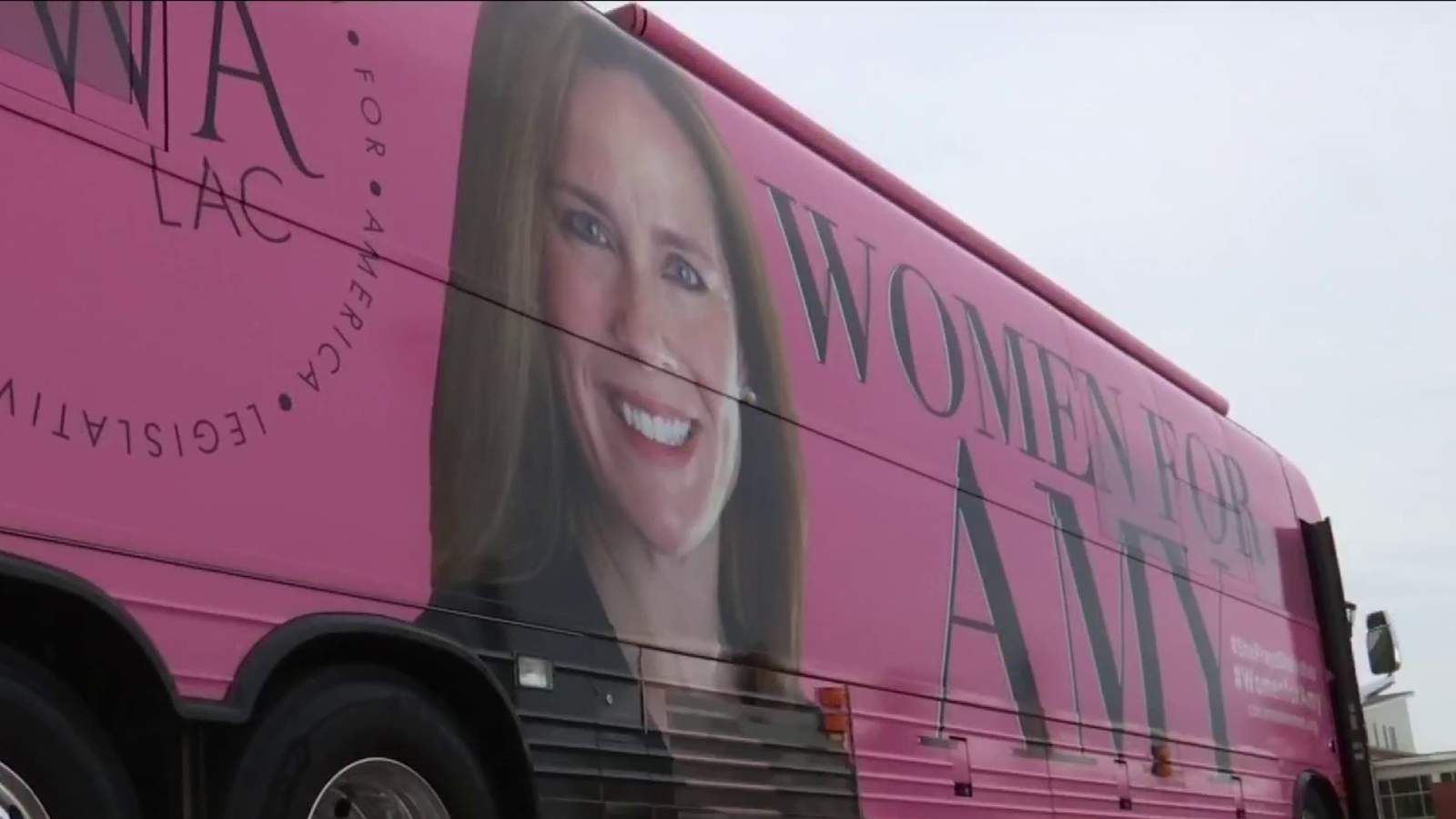 Pink mega bus supporting Amy Coney Barrett makes a pitstop at Liberty University