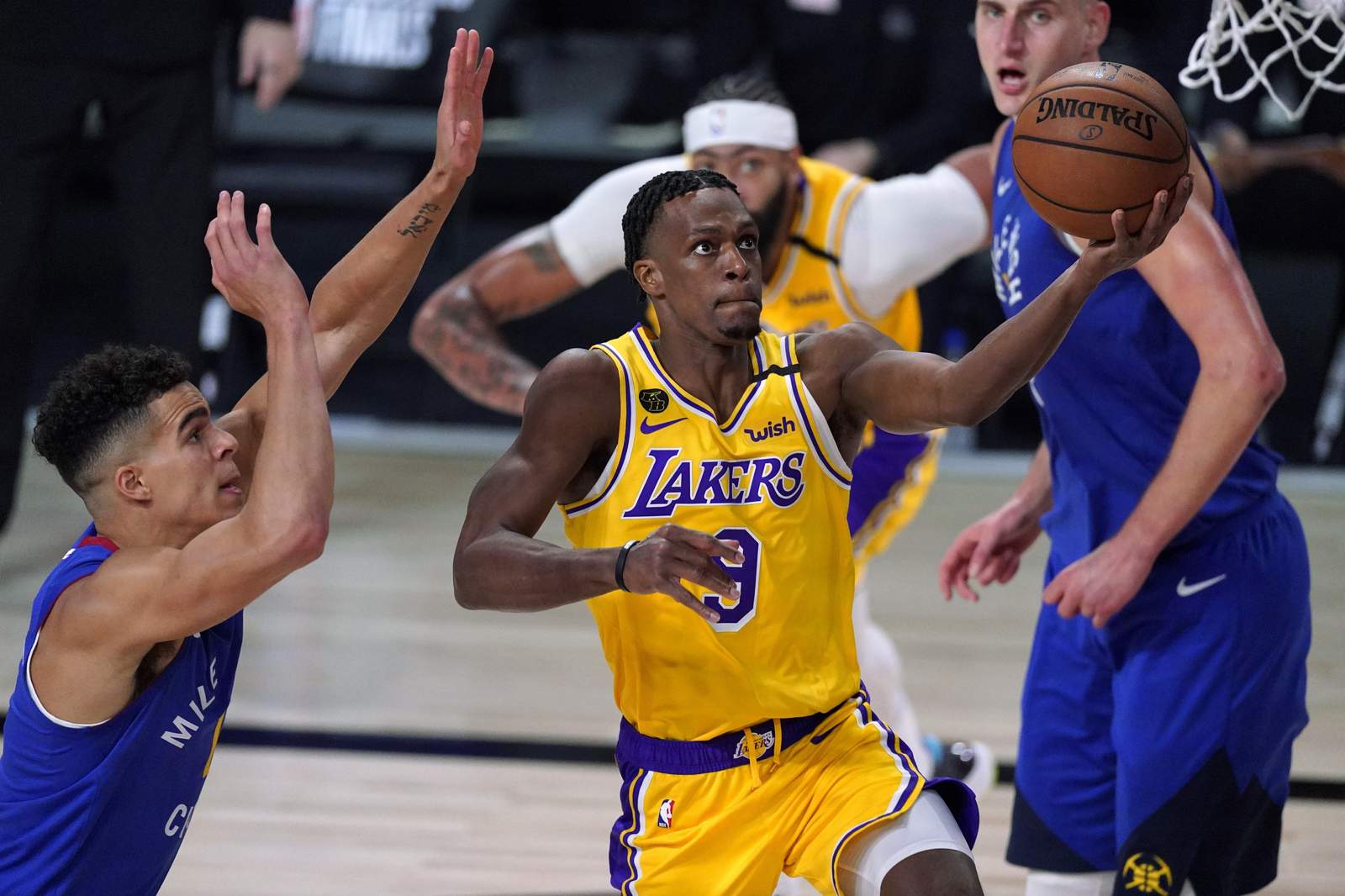 Coaching can wait: Rondo plots future, but stays in present