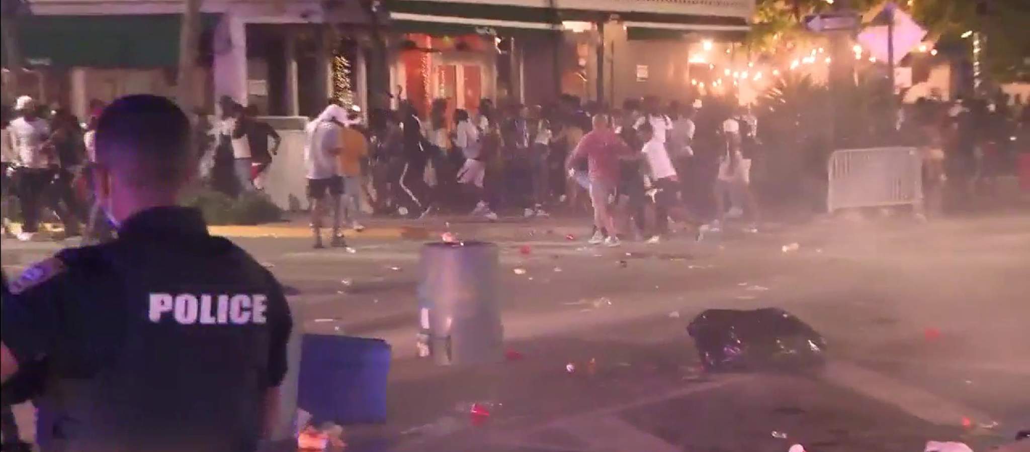 Officers fire pepper balls at spring break partygoers breaking curfew in Miami Beach