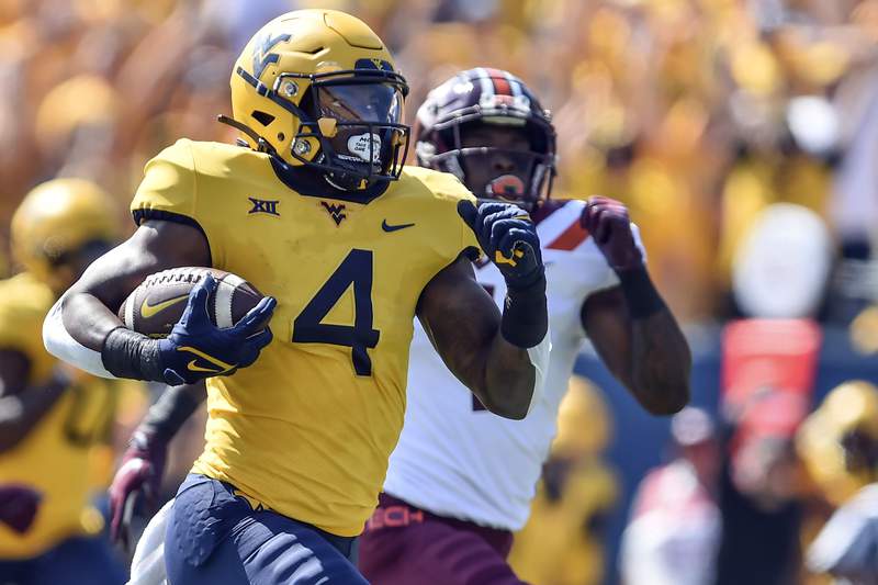 WVU builds big lead, holds on to beat No. 15 Va Tech 27-21