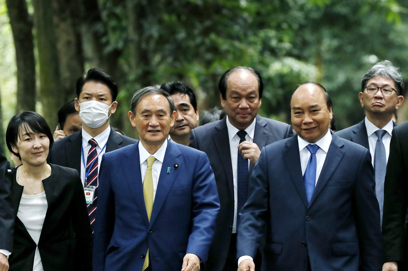 Japan, Vietnam agree to boost defense ties, resume flights