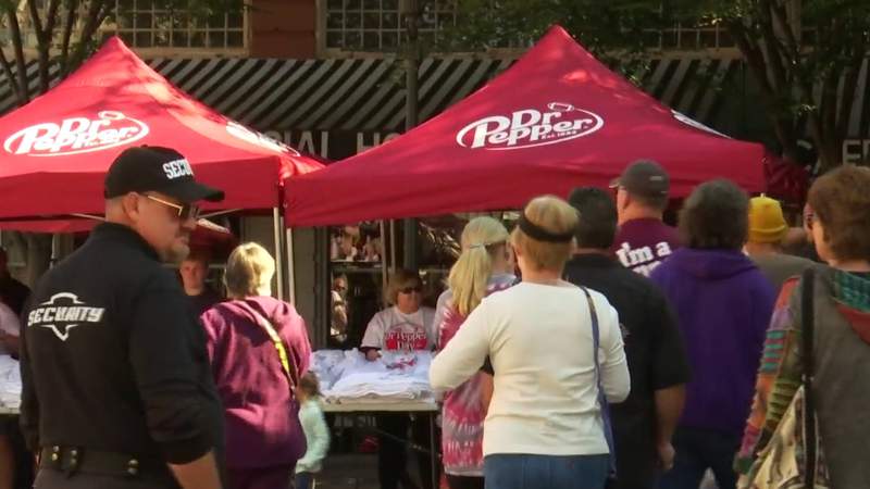 People gather for a taste of the bubbly in downtown Roanoke in honor of Dr Pepper Day