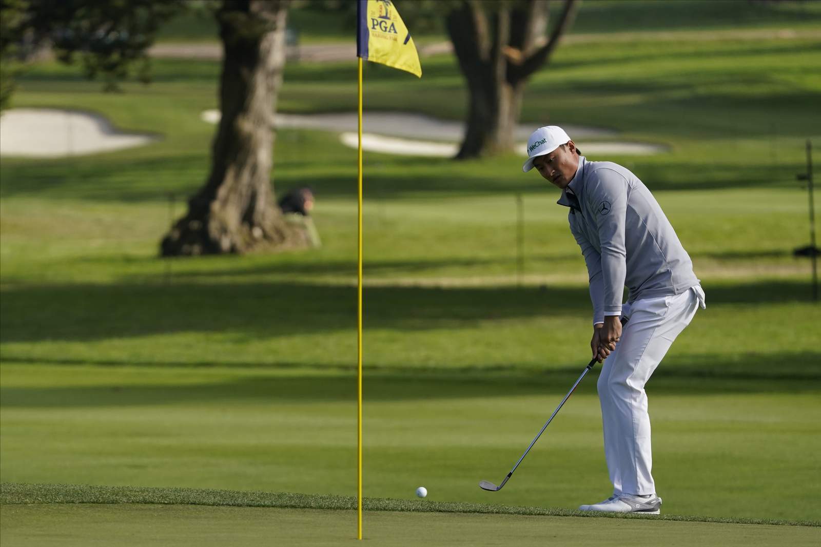 The Latest: China's Li off to strong start on 2nd day of PGA