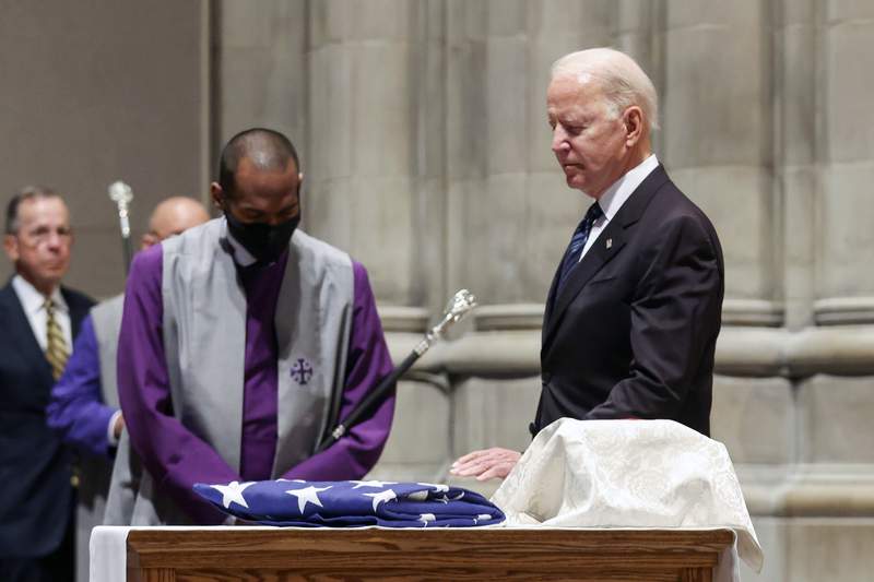 Biden mourns former Senate colleague, Virginia's John Warner