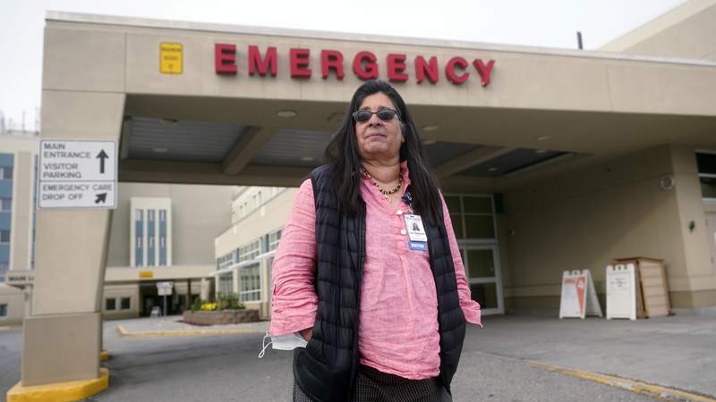 The Latest: Alaska activates emergency health protocols