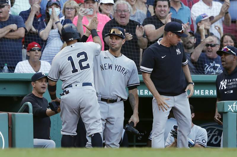 Odor, Yankees rally in 8th, end Boston's 4-game win streak