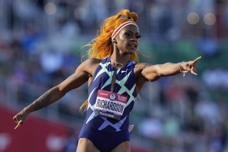 The Latest: Richardson breezes to win in 100 meters
