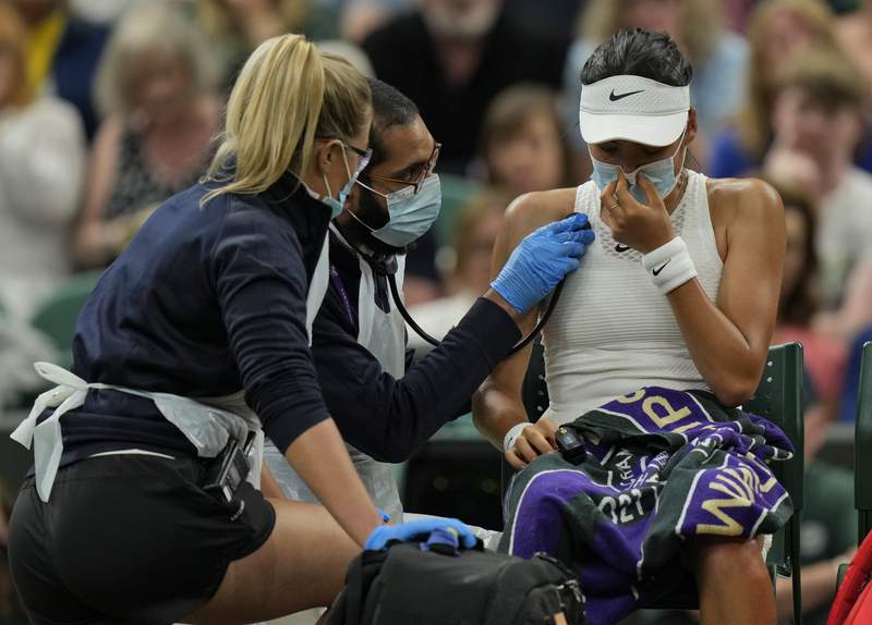 The Latest: Teen says it was hard to quit Wimbledon match