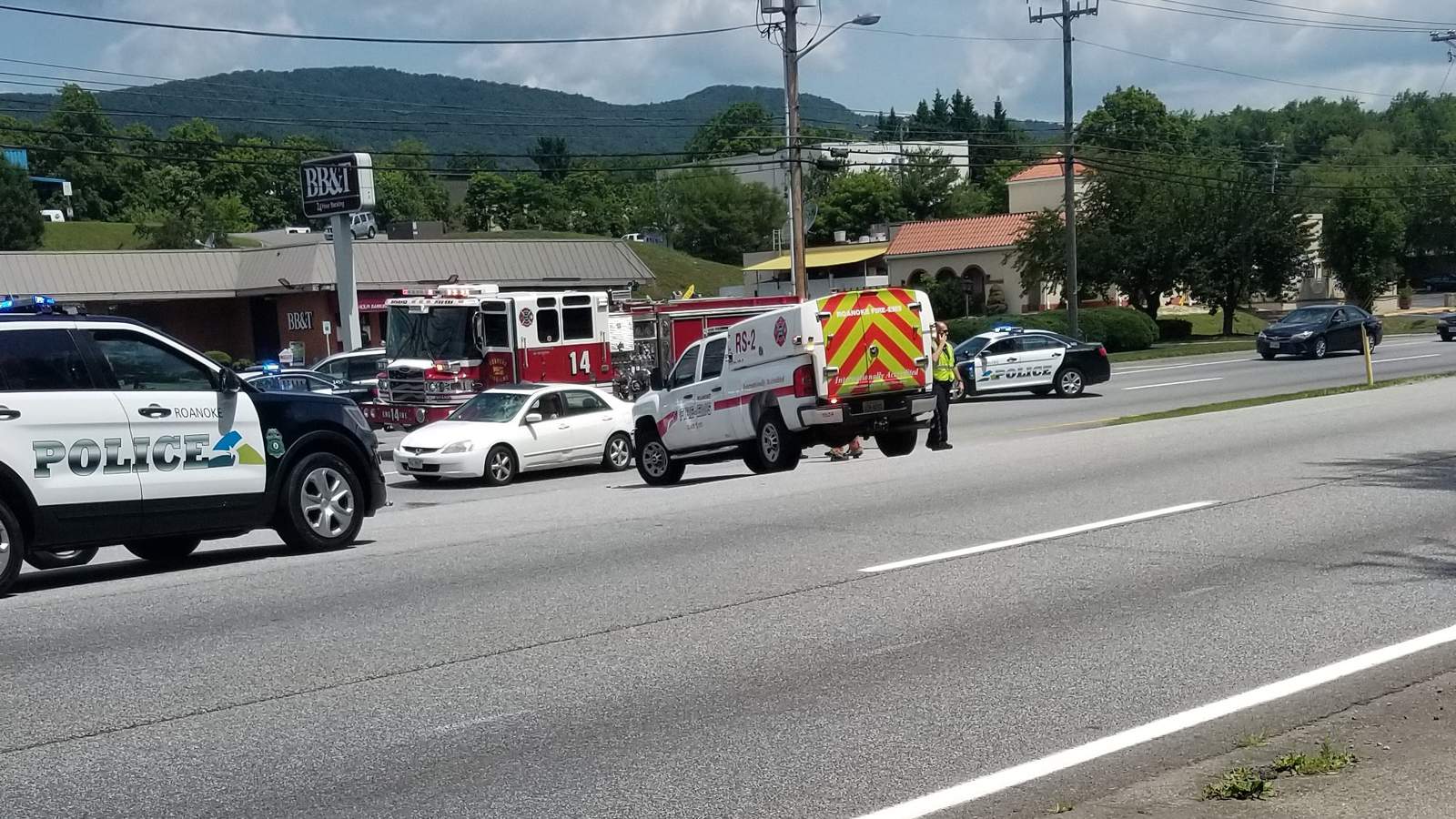 Woman hospitalized after being hit by a car in Roanoke near county border