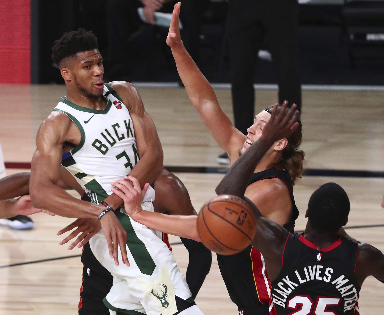 Bucks clinch top see in East with 130-116 win over Heat