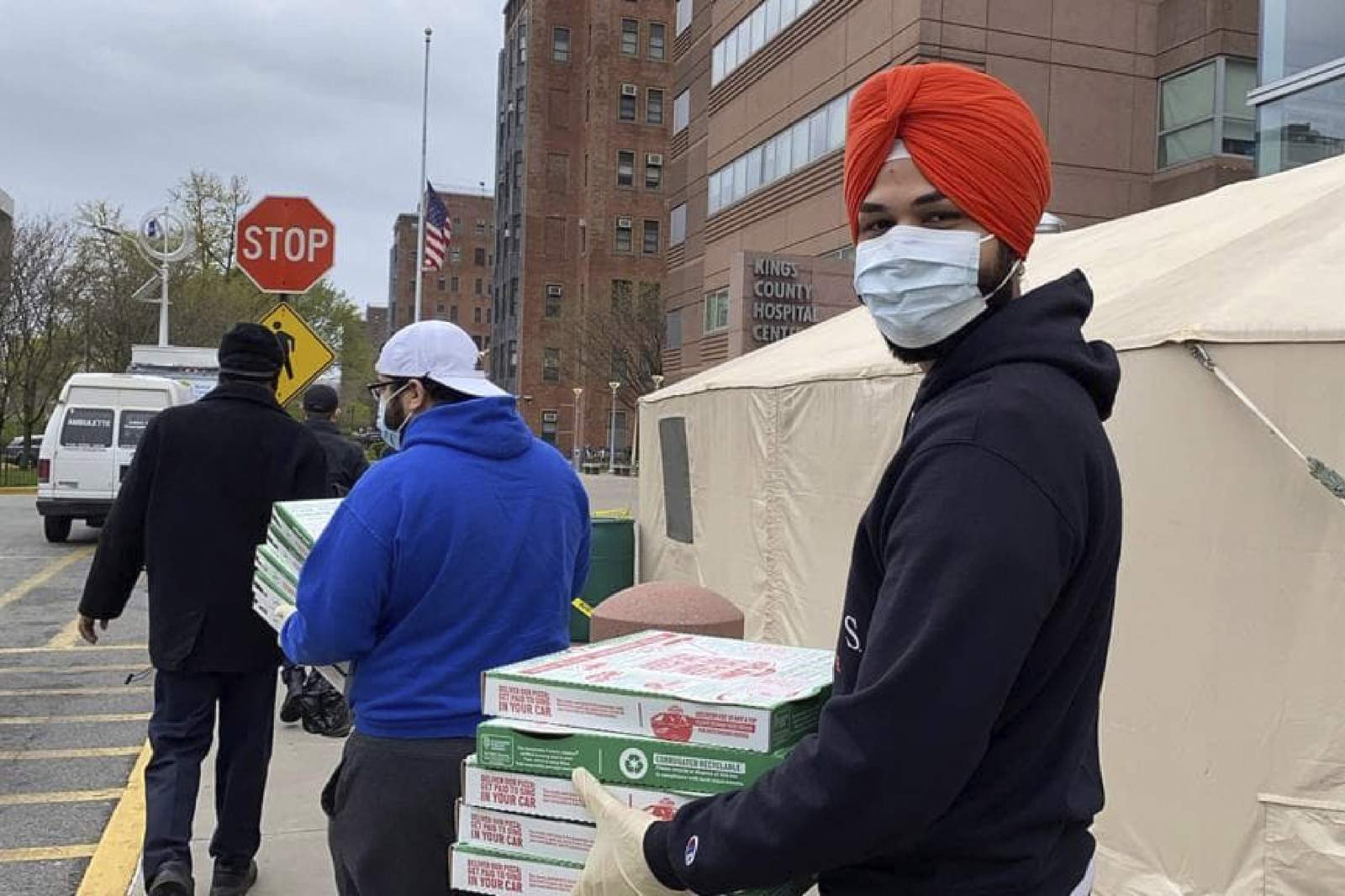 In Detroit, NYC, kindness comes one slice of pizza at a time
