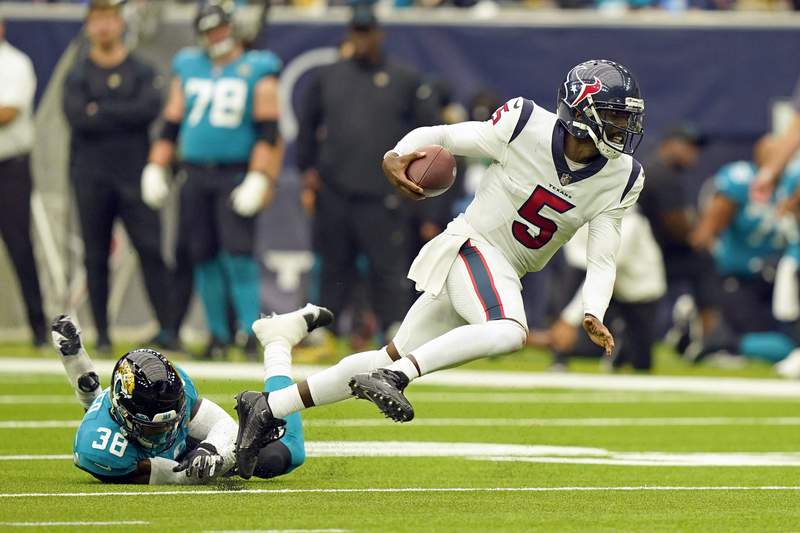 Taylor helps Texans down Lawrence, mistake-prone Jags 37-21