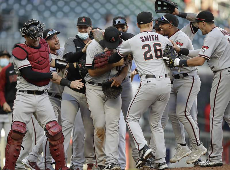 LEADING OFF: D-backs keep pitching amid no-hitter debate
