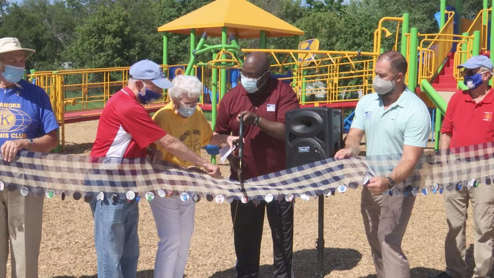 Kwanis Club of Roanoke cuts ribbon on Melrose Avenue playground