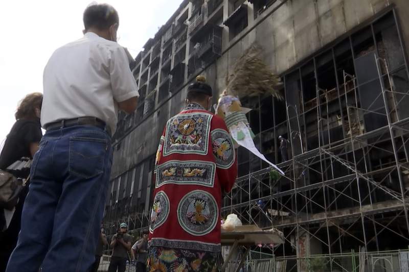Officials seek cause of Taiwan building fire that killed 46