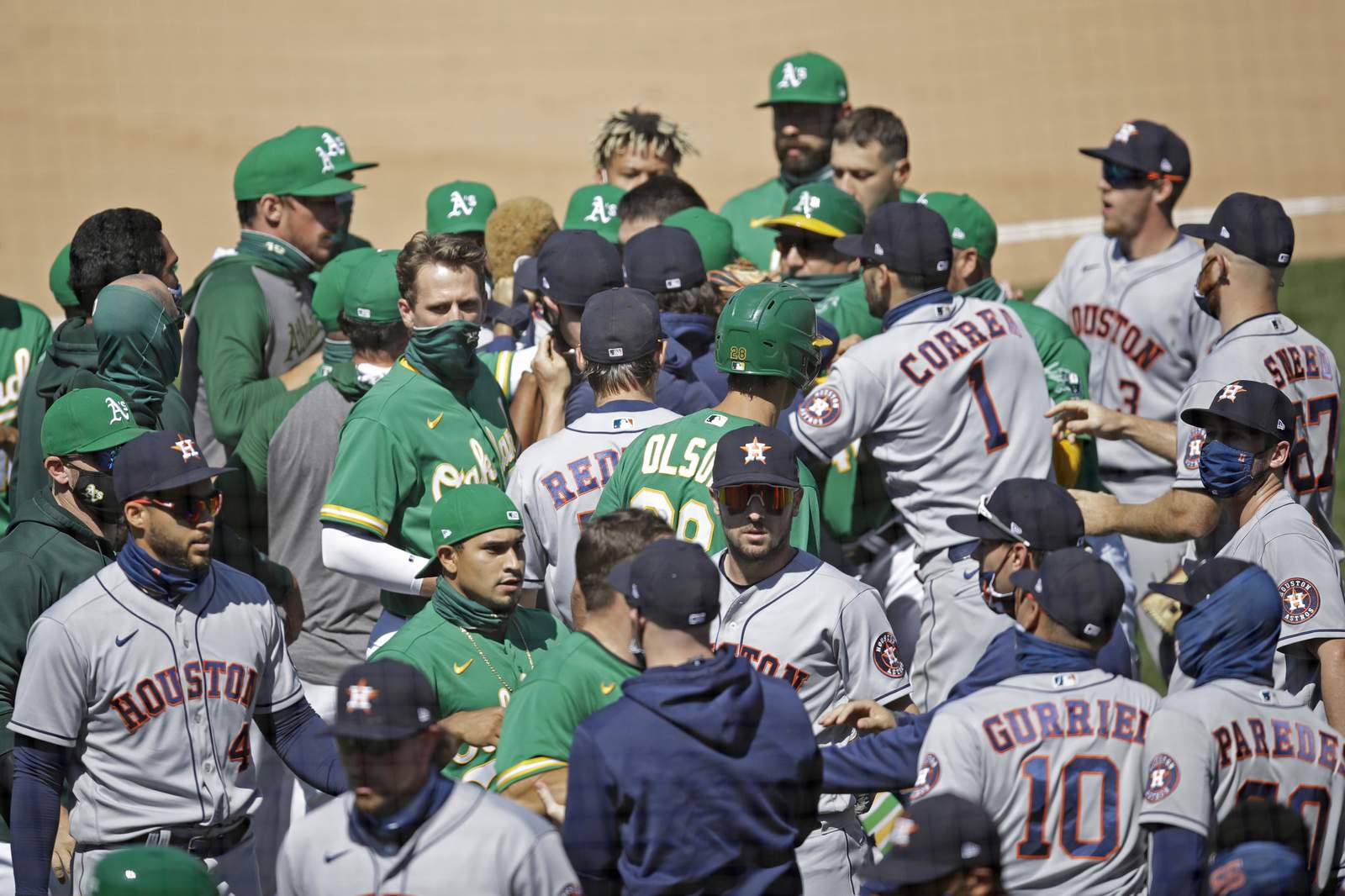Astros, A's clear benches, empty seats; Oak wins 9th in row