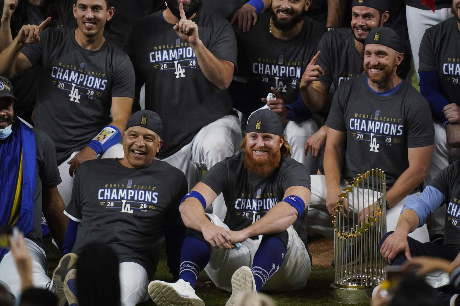 Fitting finale: Dodgers win title, Turner tests positive