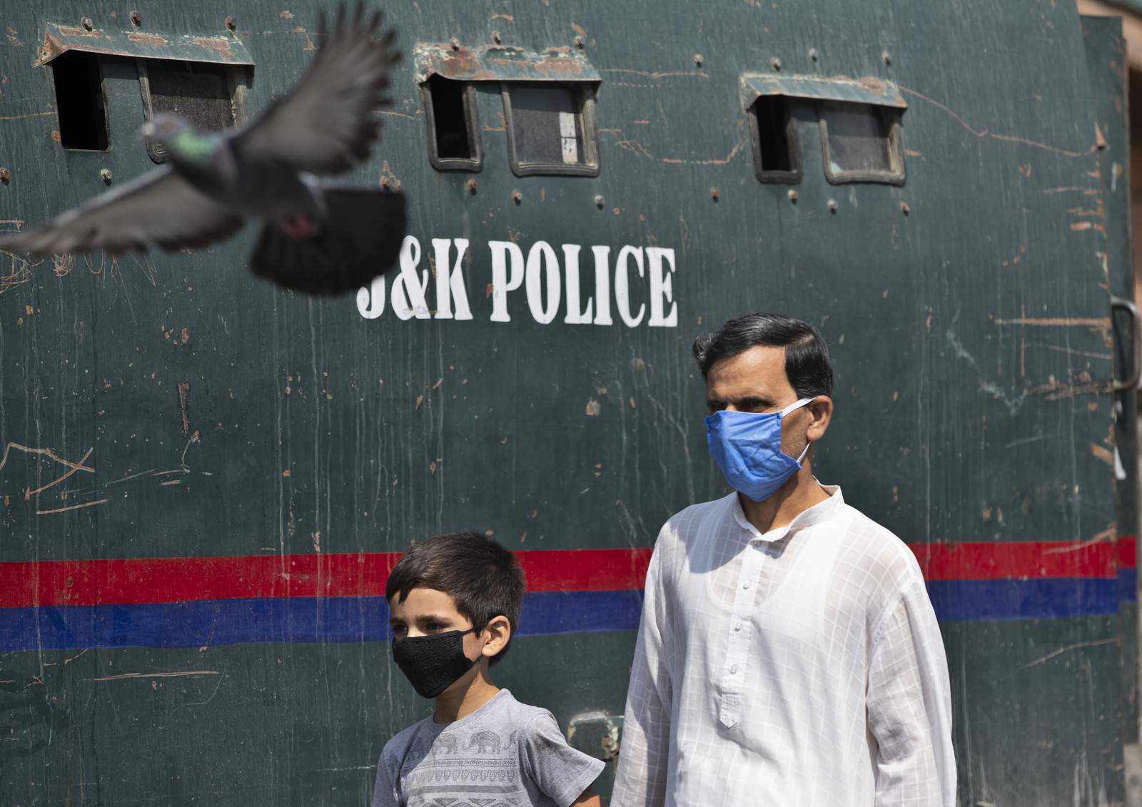 US grapples with pandemic as its origins are traced in China