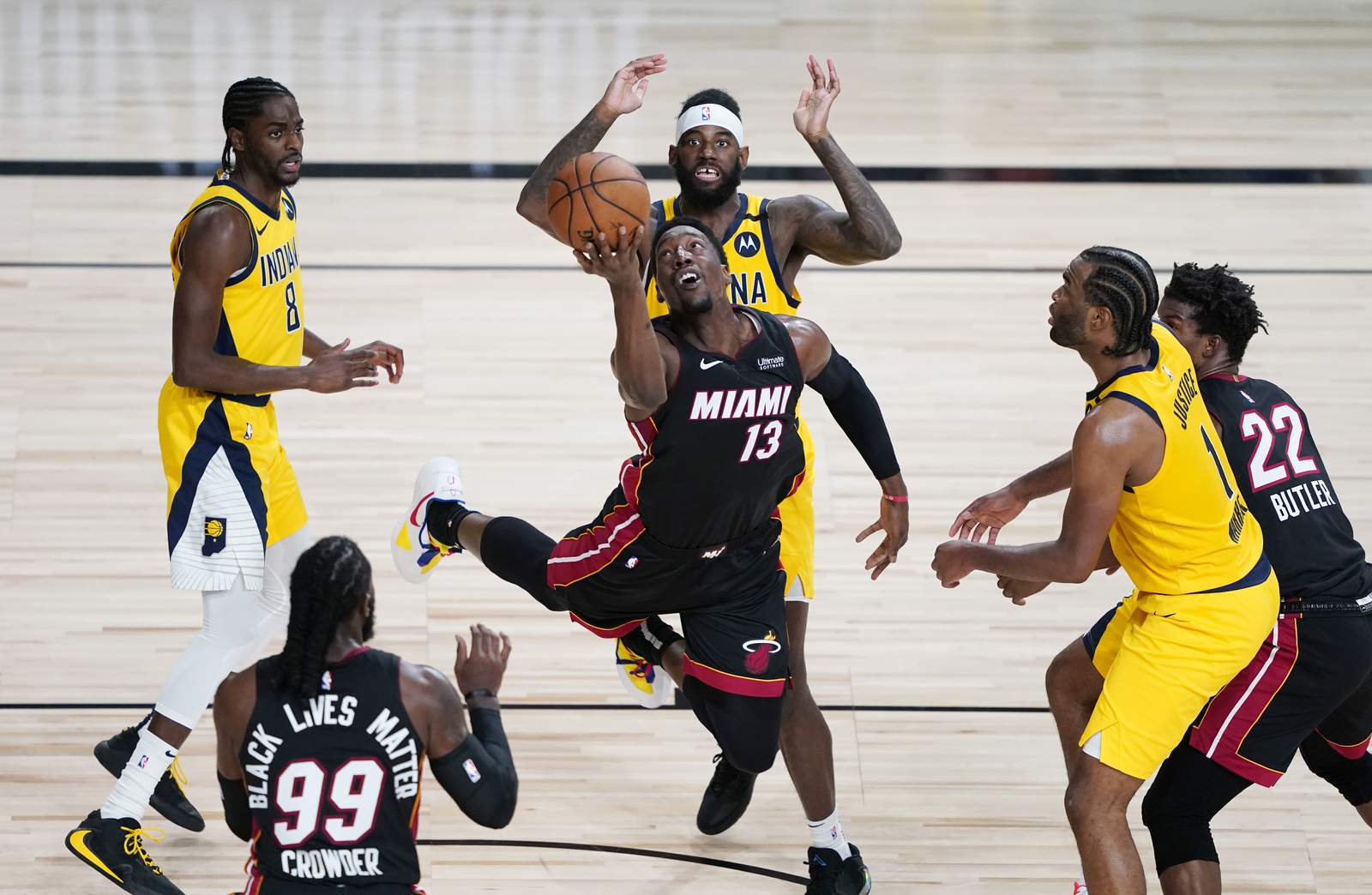 Butler, Dragic help Heat pull away to beat Pacers in Game 1