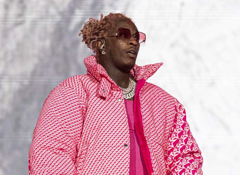 Rapper Young Thug sues over swiped bag that had cash, songs