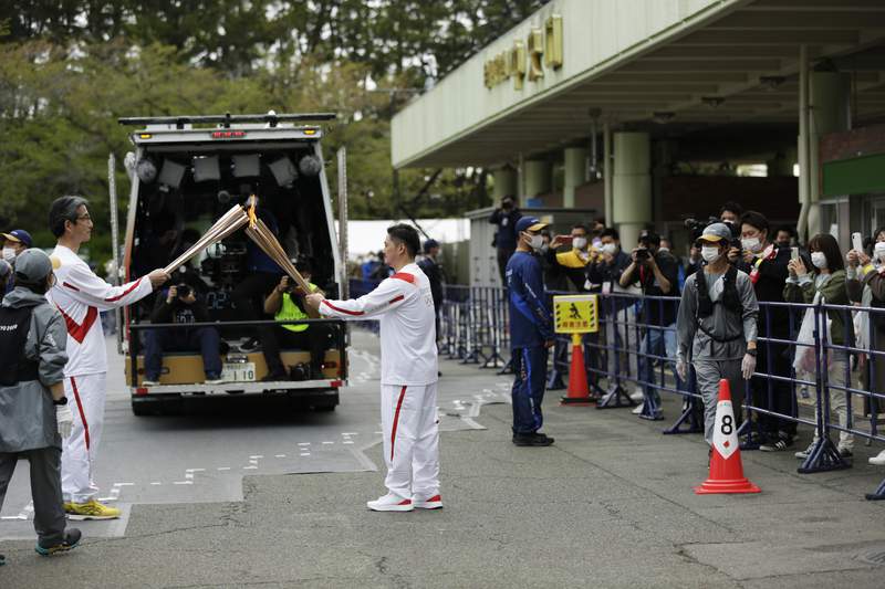 Tokyo Olympic torch relay pulled off streets in Hiroshima