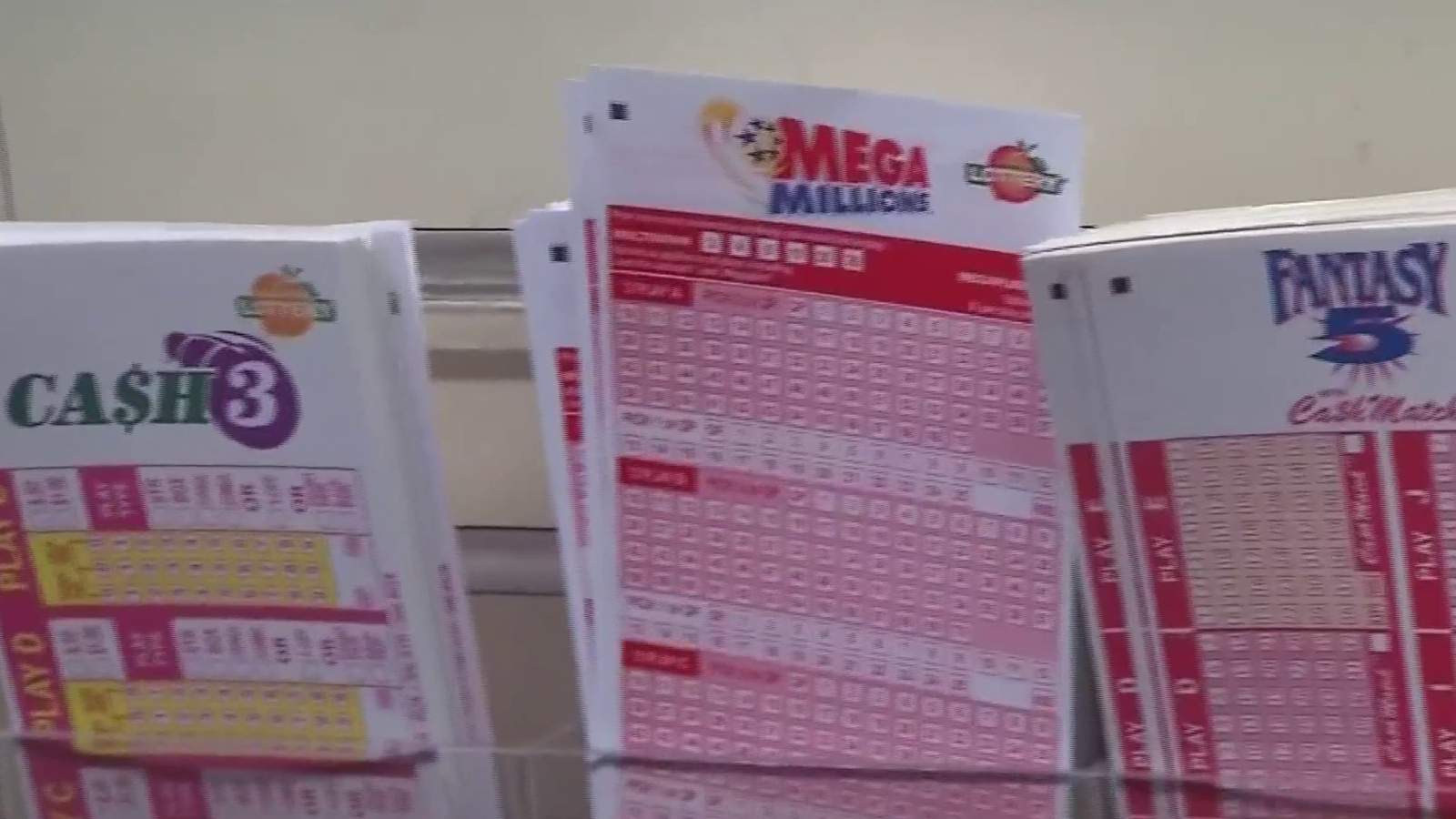 As Mega Millions and Powerball jackpots surge, here’s what to know if you bought a ticket