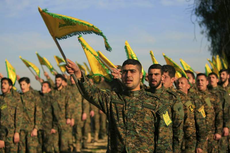 Hezbollah brag of 100,000-strong force aimed at foes at home