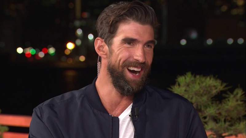 Michael Phelps cheers on Team USA’s young rookie swimmers