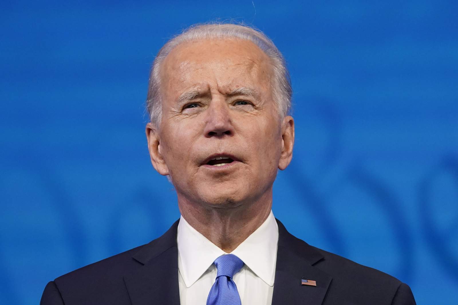 'Democracy prevailed': Biden aims to unify divided nation