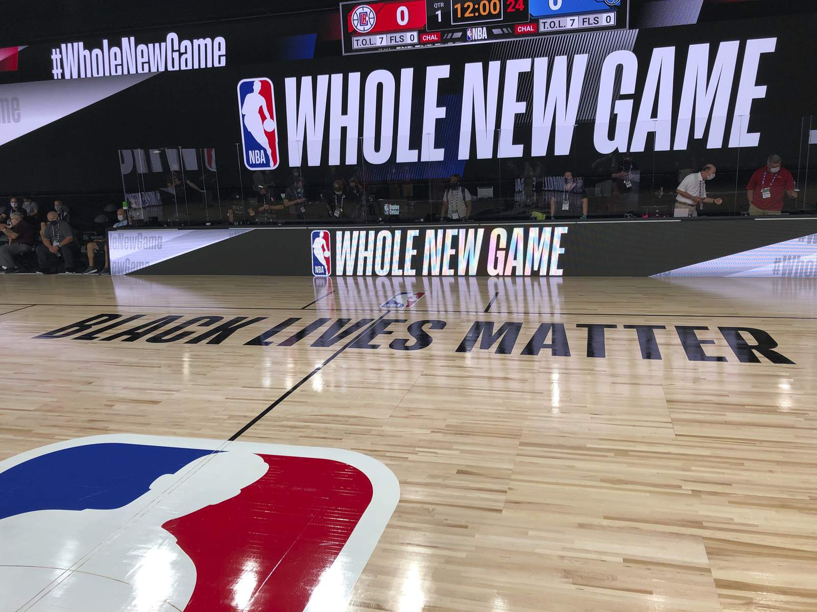 For the NBA, it's time to play, kneel and demand change