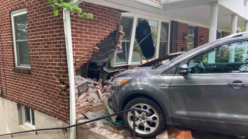 Firefighters respond after car crashes into house in Southeast Roanoke