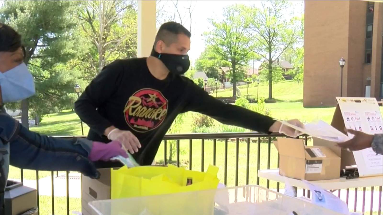 Del. Sam Rasoul passes out masks to Roanoke residents