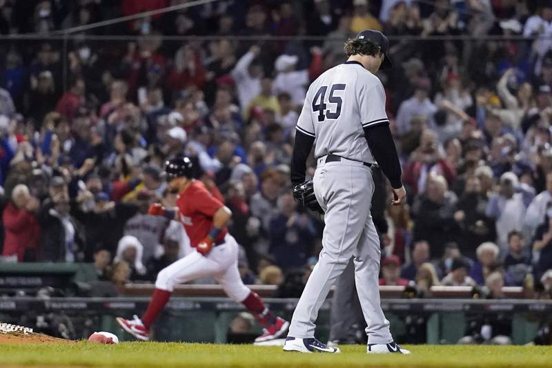 Yankees knocked out early by rival Red Sox at Fenway
