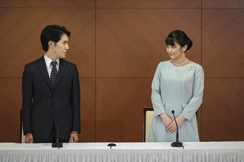 Japan's Princess Mako marries commoner, loses royal status