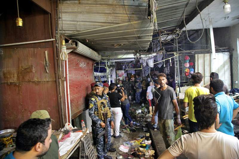Iraqi officials: Roadside bomb kills 30 in Baghdad market