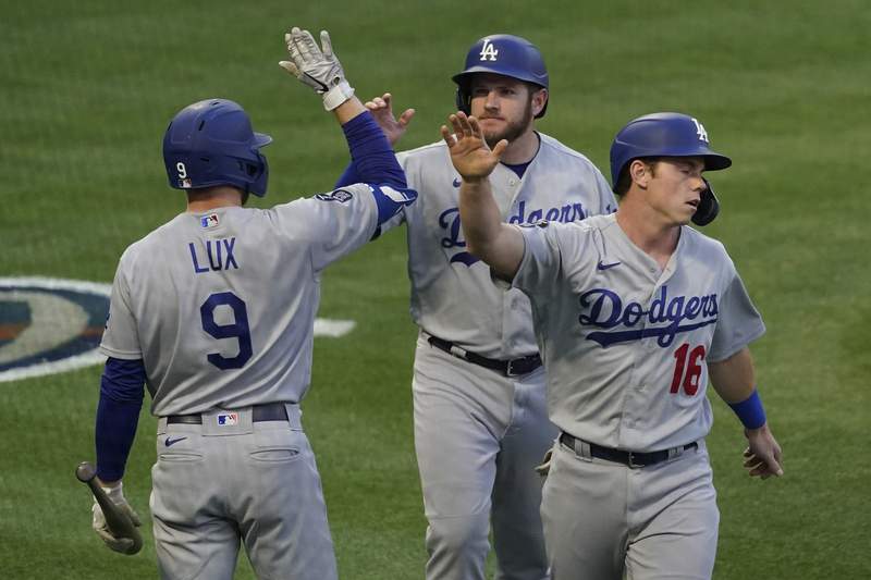 Dodgers blow most of 13-run lead, still outlast Angels 14-11