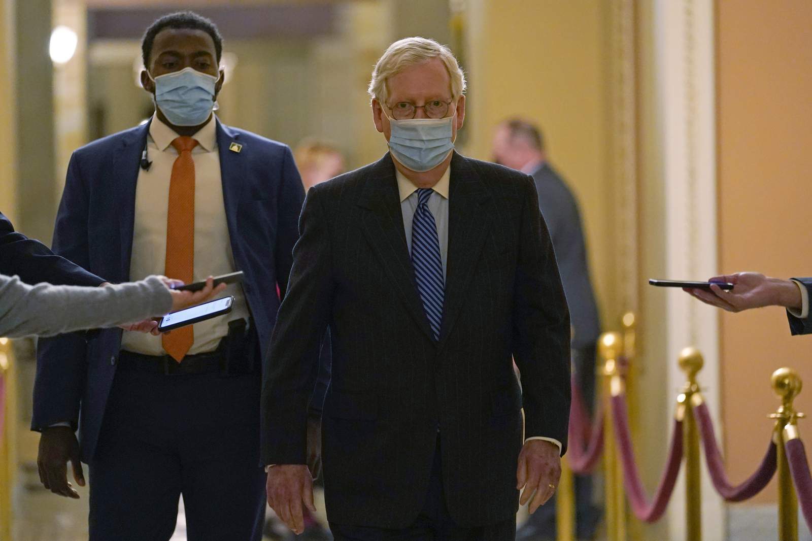 Congress averts shutdown; fight continues over pandemic aid