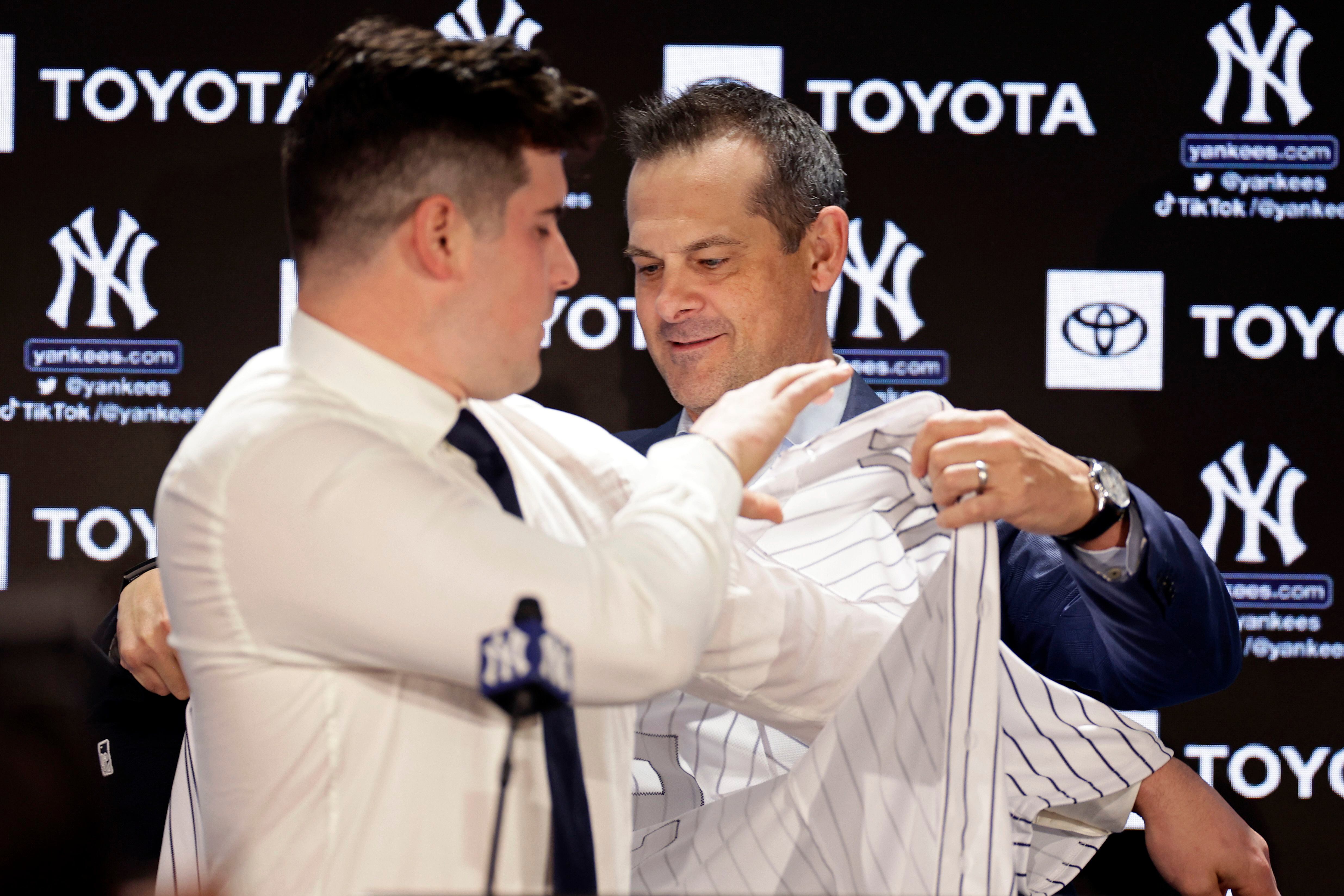 Carlos Rodón, newly shaved, puts on Yankees pinstripes
