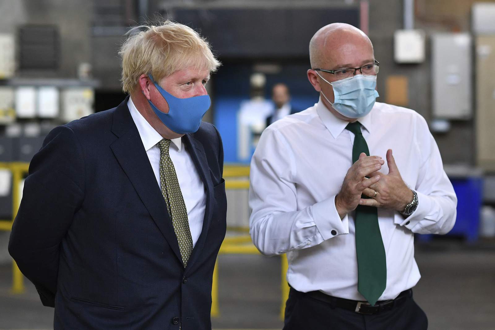 In reversal, UK says it will make masks mandatory in shops