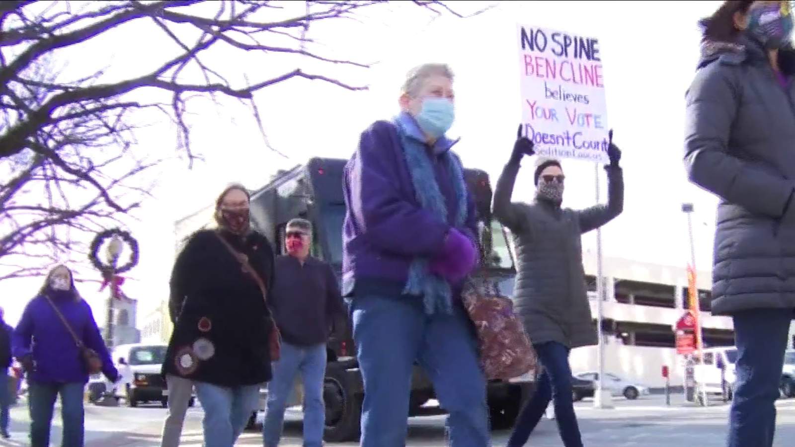 Protesters against Rep. Ben Cline march to his Roanoke office