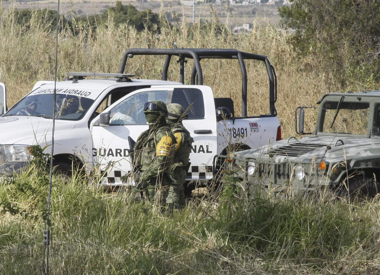 Searchers find 59 bodies in Mexico mass graves, dig for more