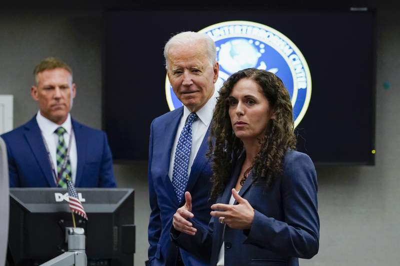 In 1st visit to intel agency, Biden warns of cyber conflict