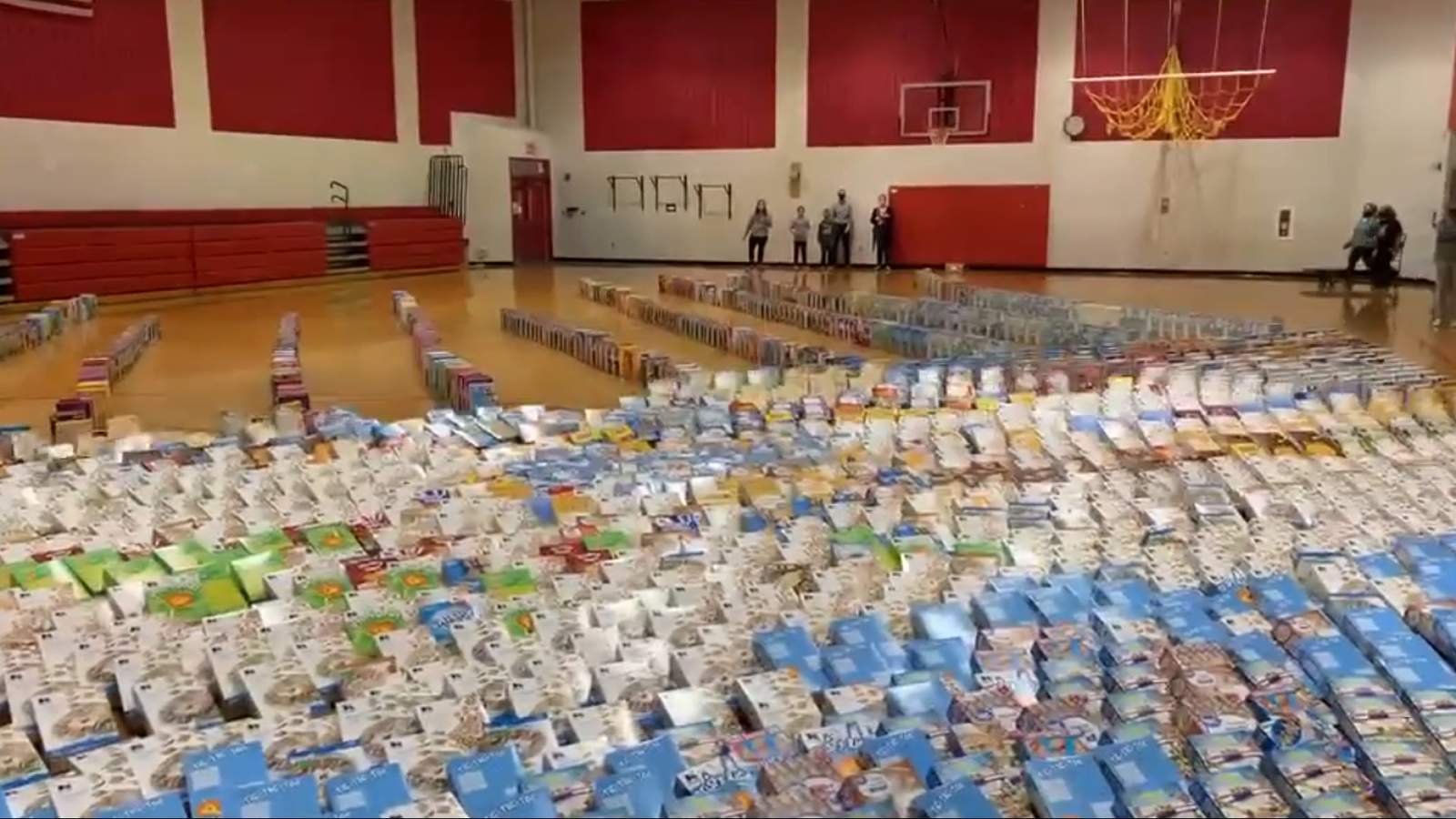 WATCH: Virginia school creates unofficial record-breaking domino run with 4,889 cereal boxes