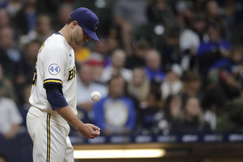 2 more Brewers positive for virus; Strickland, Cousins out