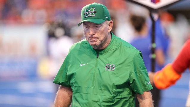 Marshall parts ways with coach Doc Holliday