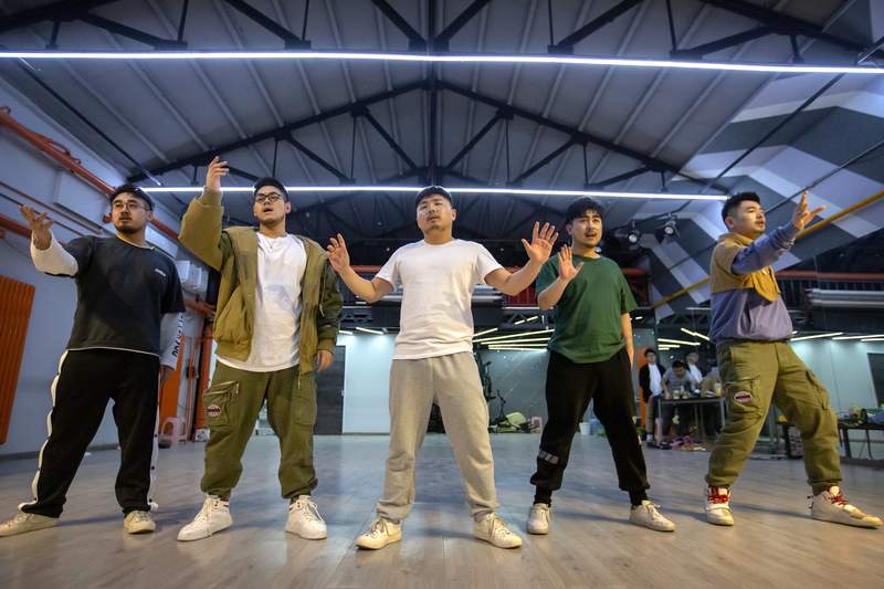 'Plus-size' boy band in China seeks to inspire fans