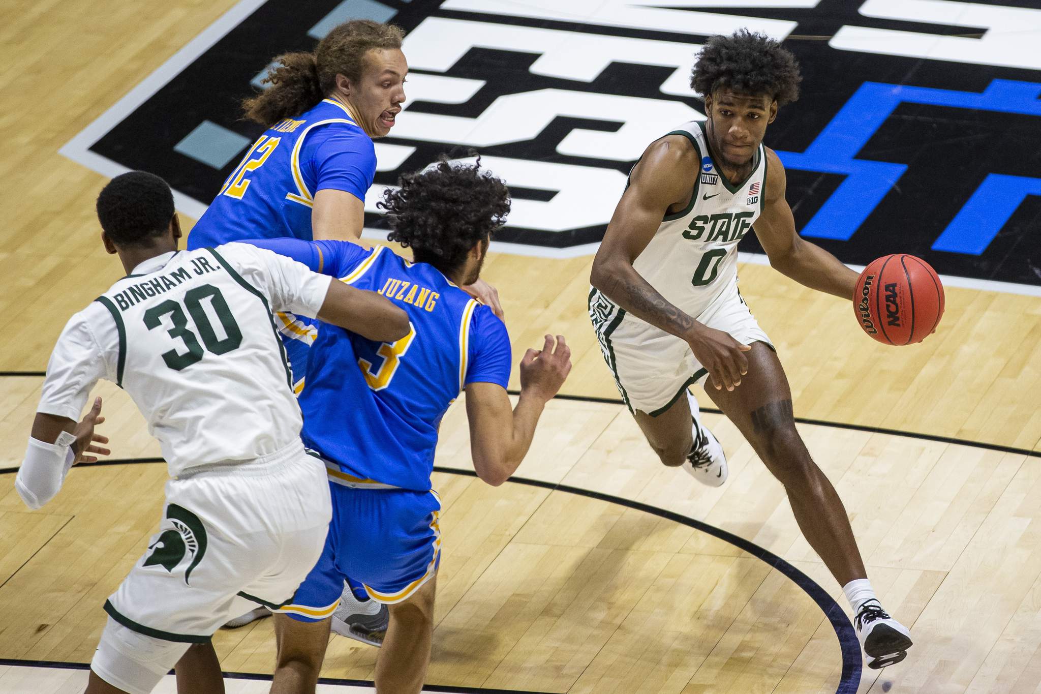 UCLA beats Michigan St 86-80 in overtime in First Four game